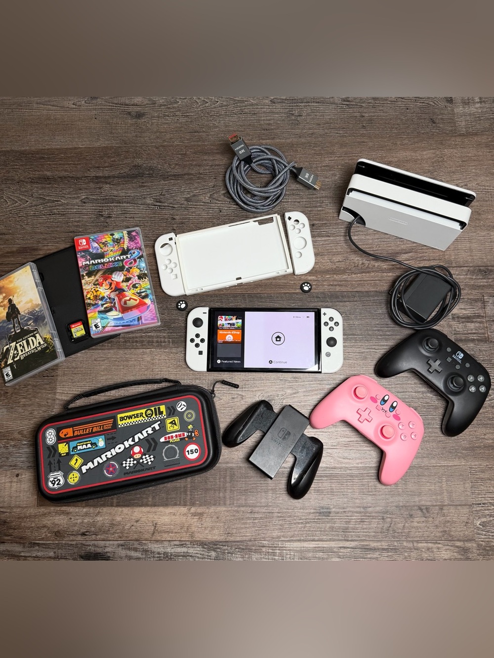 Nintendo Switch OLED Bundle + 3
Games & Accessories - Excellent
Condition